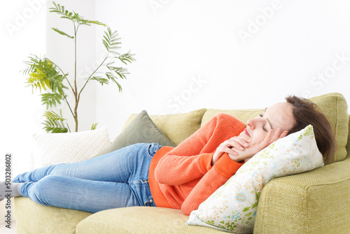 Woman taking a nap at home