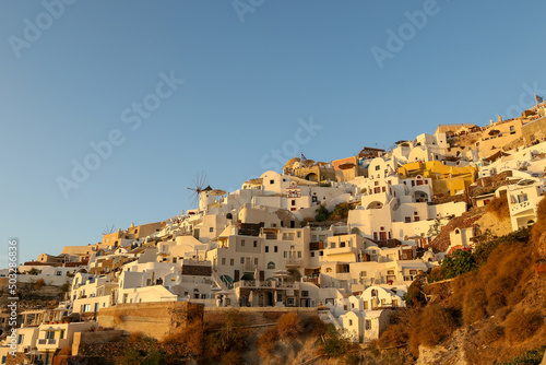 The whitewashed hillside buildings of the village Oia, Santorini, Greece © Kim