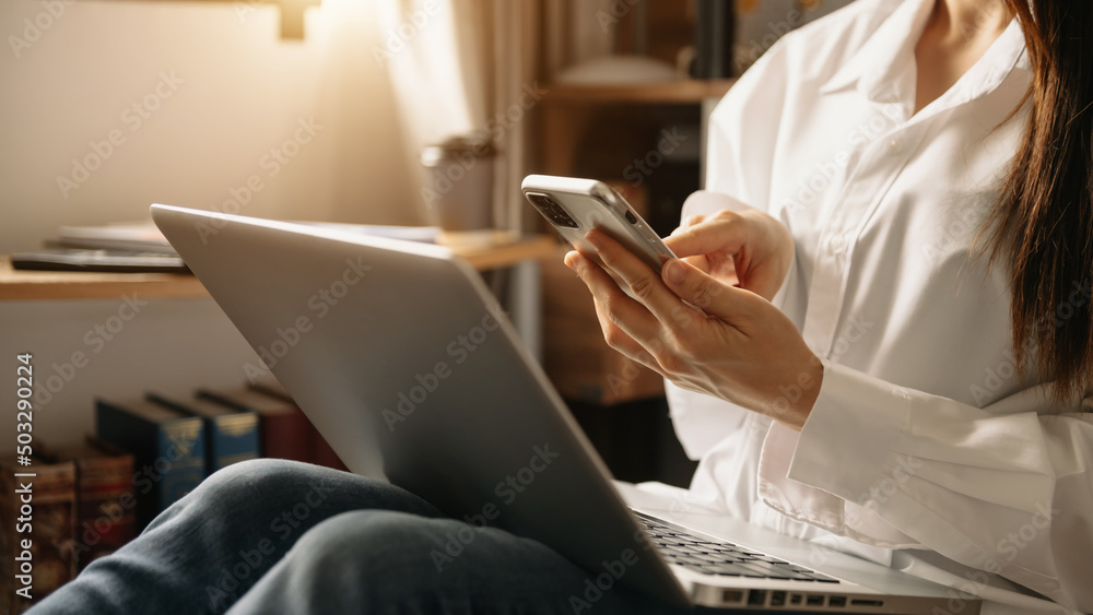 Hand using tablet ,laptop, and holding mobile with credit card online banking payment shopping Hand using tablet ,laptop, and holding mobile with credit card online banking payment shopping