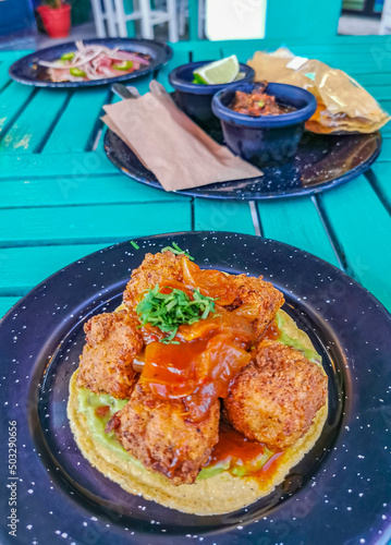 Plate of Fishballs tortillas restaurant PapaCharly Playa del Carmen Mexico. photo