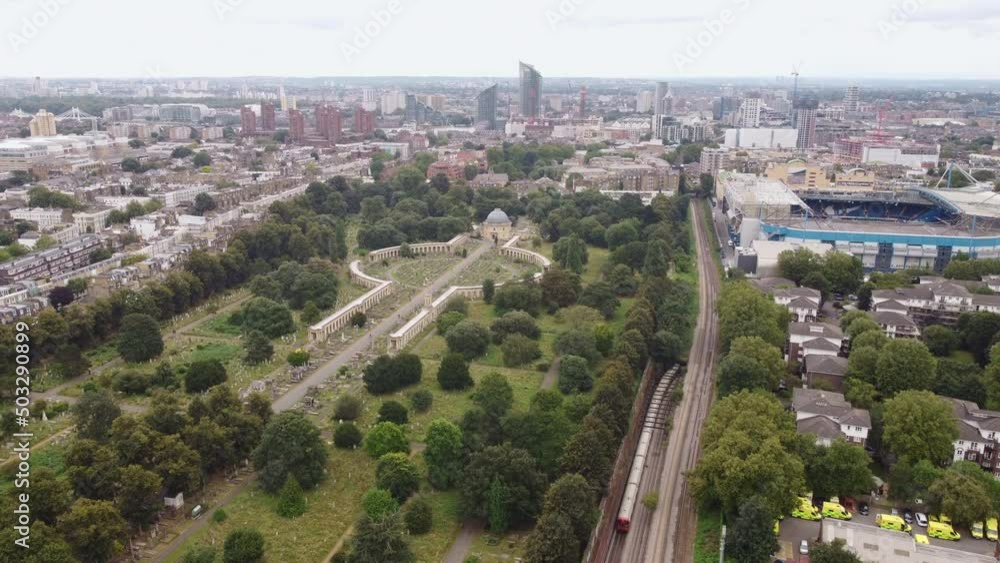 Static high-rise shot with Brompton Cemetery and the city skyline behind. Static high-rise shot with Brompton Cemetery and the city skyline behind.
