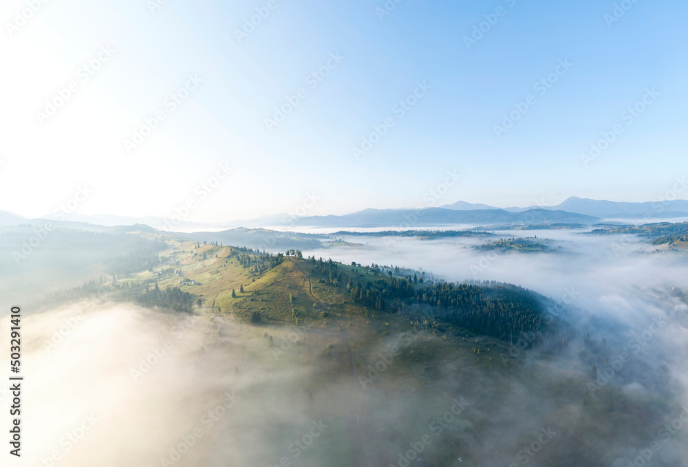 Ukrainian Carpathians mountains on a summer morning. Aerial drone view. Ukrainian Carpathians mountains on a summer morning. Aerial drone view.