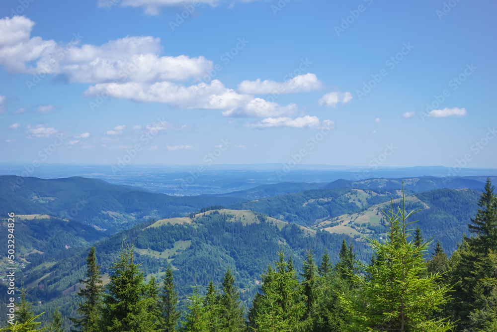 View of the mountains with beautiful clouds on the way  to the Pysanyj stone.Carpathians