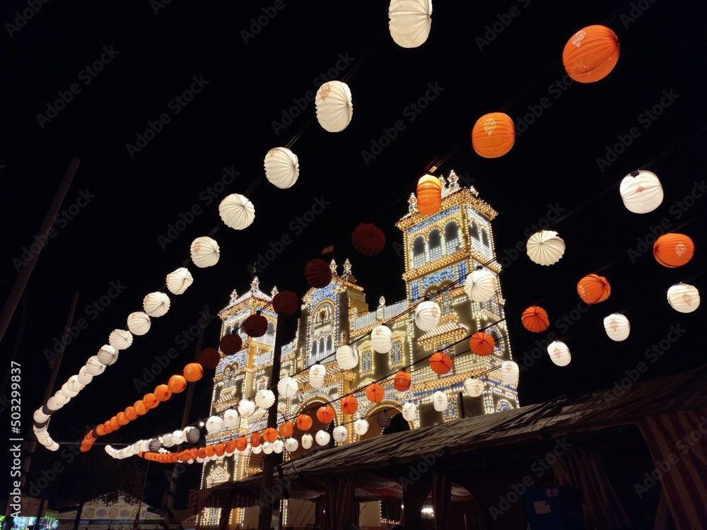 Fototapeta premium The night over the Feria de abril, Seville, andalusia, spain 