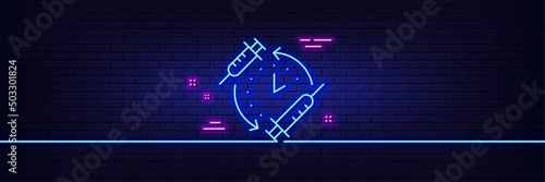 Neon light glow effect. Vaccination schedule line icon. Vaccine syringe sign. Second injection time symbol. 3d line neon glow icon. Brick wall banner. Vaccination schedule outline. Vector
