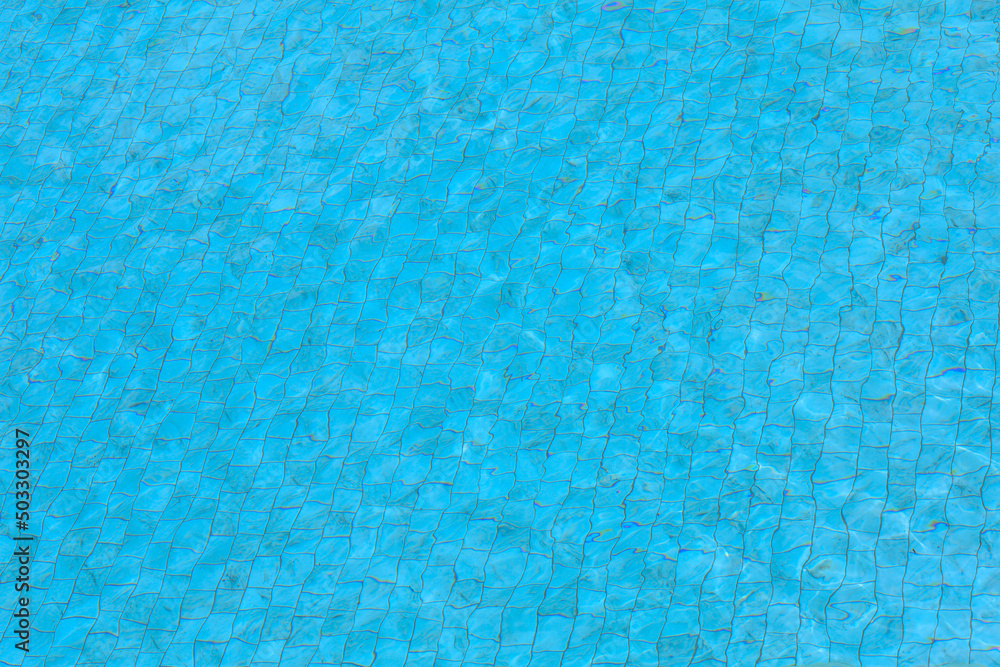 The water on swimming pool for background and texture The water on swimming pool for background and texture