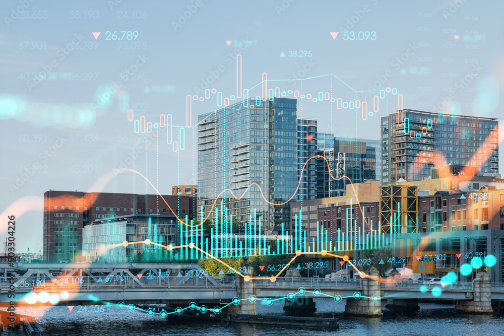 Fototapeta premium Panorama city view of Boston Harbor at day time, Massachusetts. Building exteriors of financial downtown. Glowing FOREX graph hologram. The concept of international trading and fundamental analysis