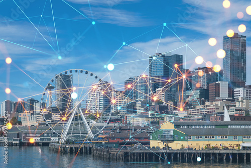 Seattle skyline with waterfront view. Skyscrapers of financial downtown at day time  Washington  USA. Social media hologram. Concept of networking and establishing new people connections