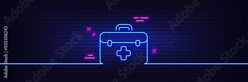 Neon light glow effect. First aid line icon. Medicical kit sign. Pharmacy medication symbol. 3d line neon glow icon. Brick wall banner. First aid outline. Vector