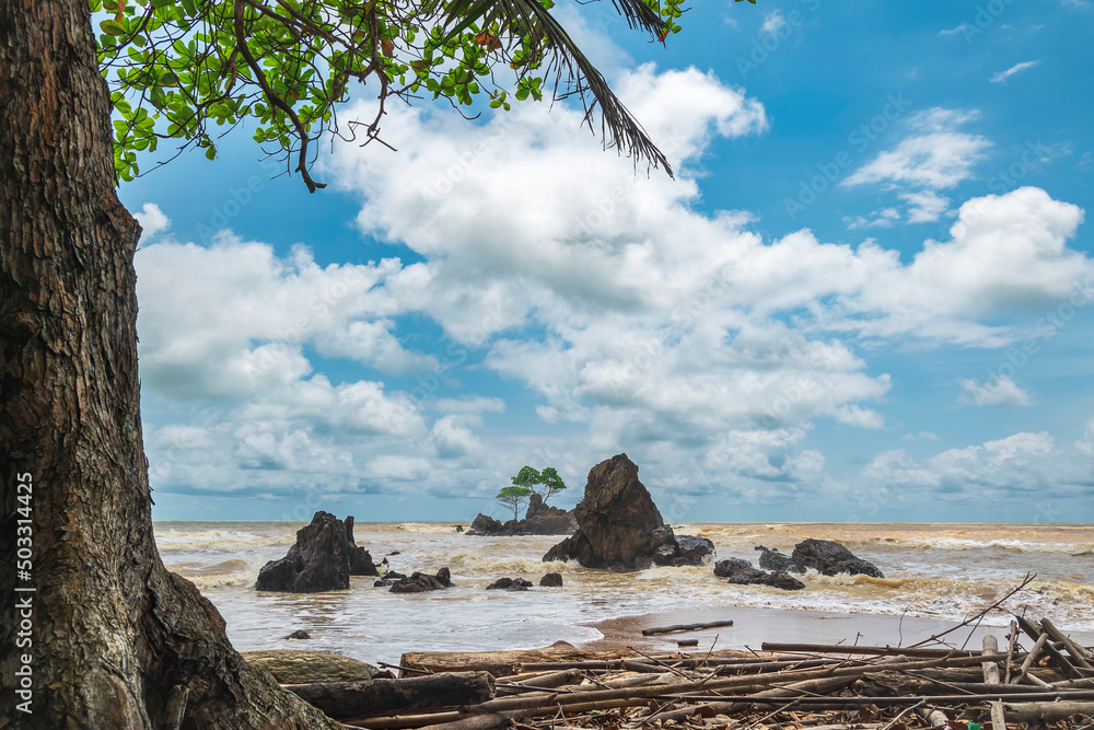 Africa's beautiful beach in Axim Ghana with untouched nature and a beautiful sea that changes color. Africa's beautiful beach in Axim Ghana with untouched nature and a beautiful sea that changes color.