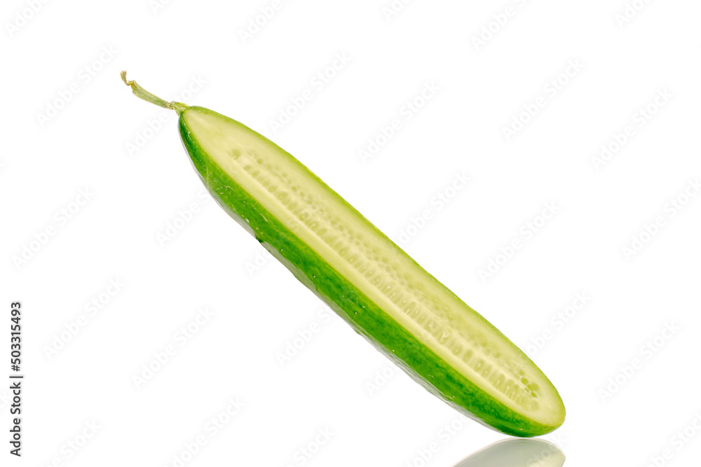 One half of a juicy smooth cucumber, macro, isolated on a white background. One half of a juicy smooth cucumber, macro, isolated on a white background.