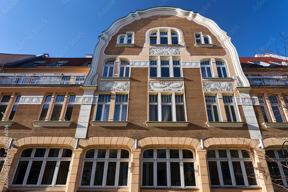 facade of a historic tenement house in the city of Poznan in Poland
facade of a historic tenement house in the city of Poznan in Poland