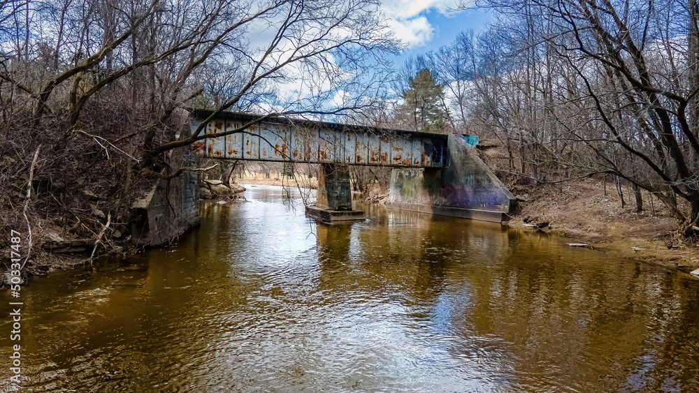 Fototapeta premium A spring day at the park over the river