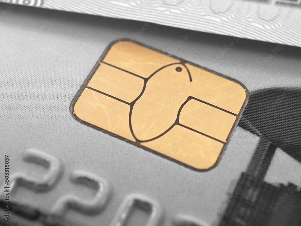 Fragments of a bank plastic card and banknote. Yellow integrated chip closeup. It is highlighted in color. The rest of the picture is black and white. Payment system Mir. Macro Fragments of a bank plastic card and banknote. Yellow integrated chip closeup. It is highlighted in color. The rest of the picture is black and white. Payment system Mir. Macro