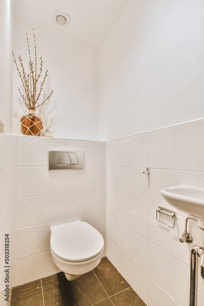 Interior of bathroom with toilet Interior of bathroom with toilet