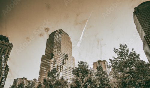 NEW YORK CITY - JUNE 2013: World Trade Center on a beautiful sunny day. It replaces the original seven buildings on the same site that were destroyed in the September 11 attacks.