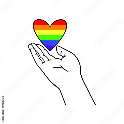 Arm holding the heart coloured in LGBT pride colours on the white background. Concept of the International Day Against Homophobia concept, sexual equality, feminism, social safety.
