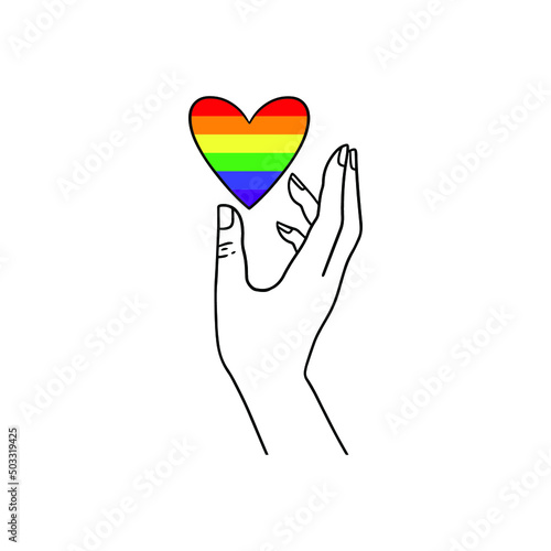 Arm holding the heart coloured in LGBT pride colours on the white background. Concept of the International Day Against Homophobia concept, sexual equality, feminism, social safety.