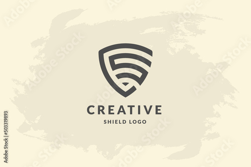 Initial letter cs in shape of shield. Handwriting vector logo design illustration image