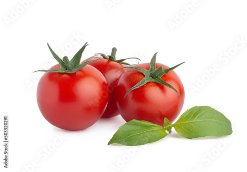 Tomatoes, garlic, peppers, basil on a white isolated background. Ingredients for tomato sauce
