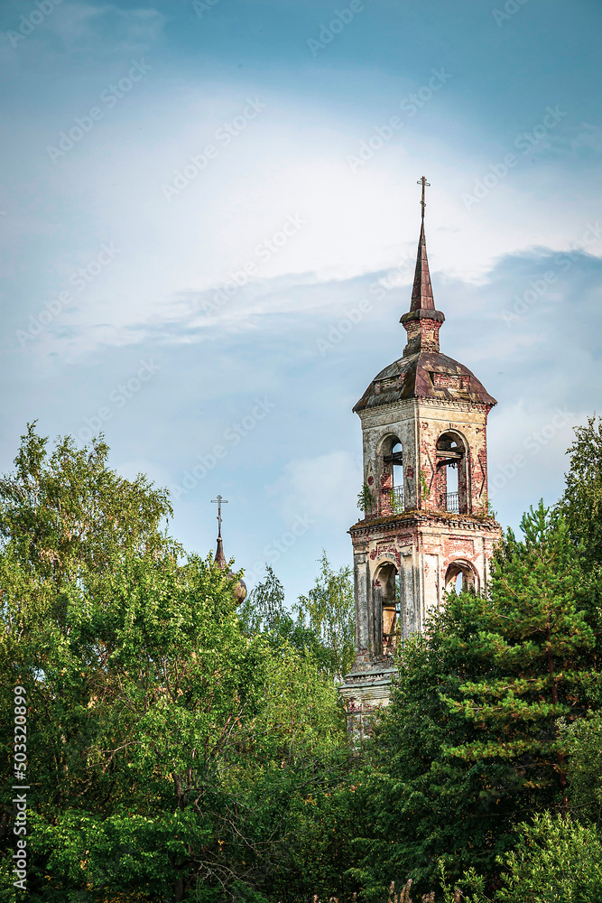 the bell tower of an abandoned Orthodox church