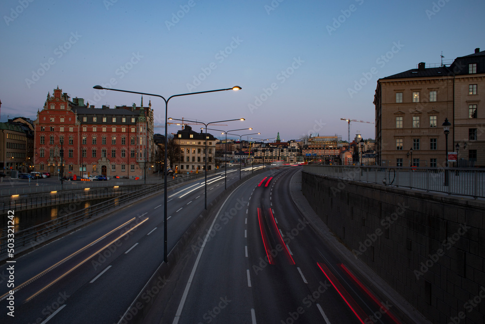 GAMLA STAN TRAFIC. STOCKHOLM CITYSCAPE WITH BRIDGE