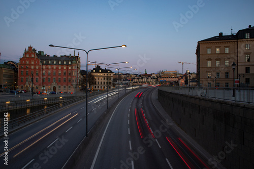 GAMLA STAN TRAFIC. STOCKHOLM CITYSCAPE WITH BRIDGE