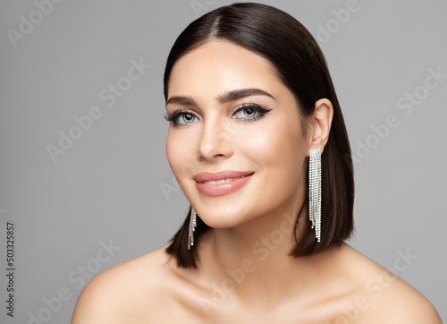 Stampa su tela Beauty Woman Portrait with Perfect Make up and Silver Earrings