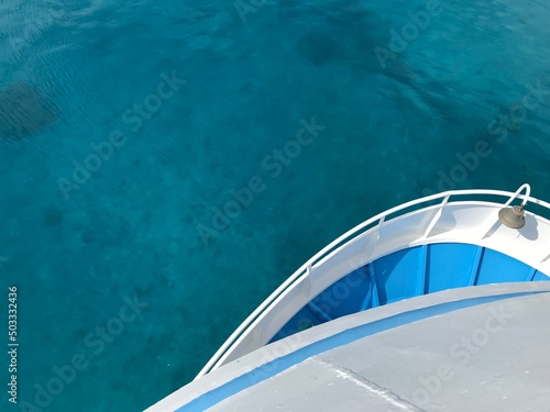 Front of boat at sea water background 