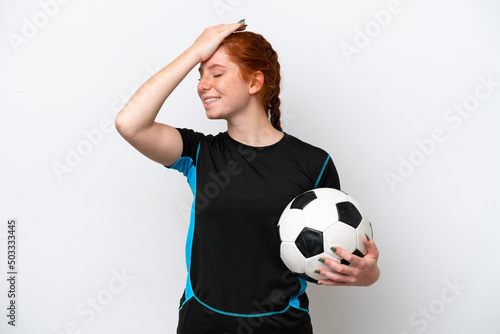 Young caucasian reddish football player woman isolated on white background has realized something and intending the solution © luismolinero