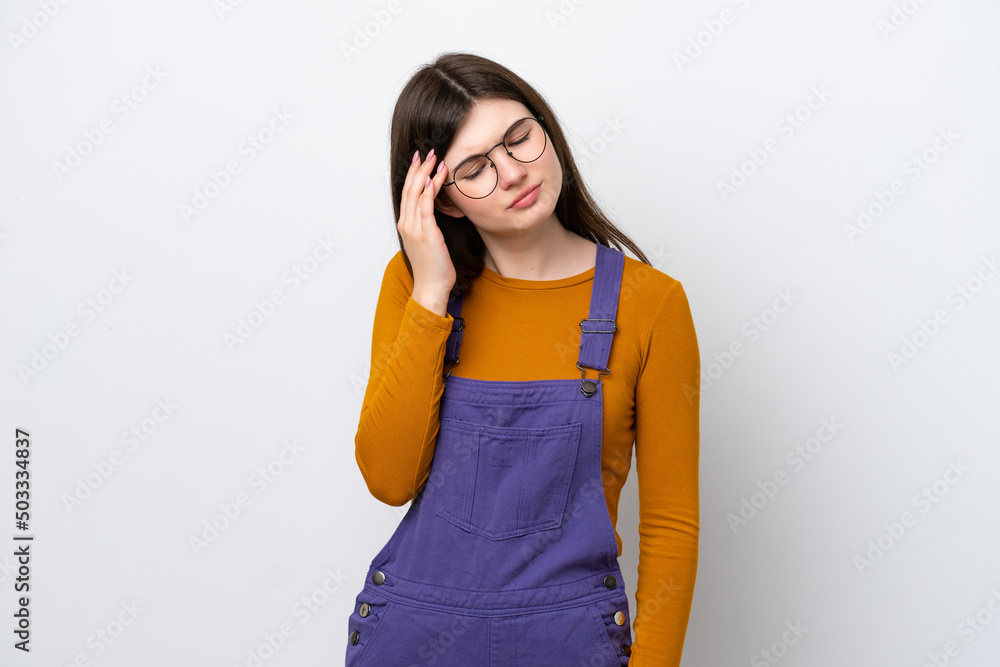 Young Russian woman isolated on blue background with headache Young Russian woman isolated on blue background with headache