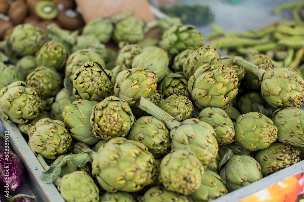 Fresh artichokes on sale at the local market. Fresh artichokes on sale at the local market.
