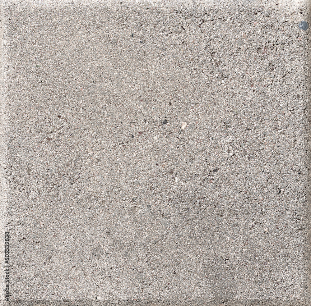 Concrete or cobble gray square pavement slab or stone for floor, wall or path. Traditional fence. Concrete or cobble gray square pavement slab or stone for floor, wall or path. Traditional fence.
