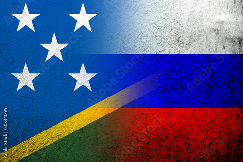 National flag of Russian Federation with National flag of The Solomon Islands. Grunge background