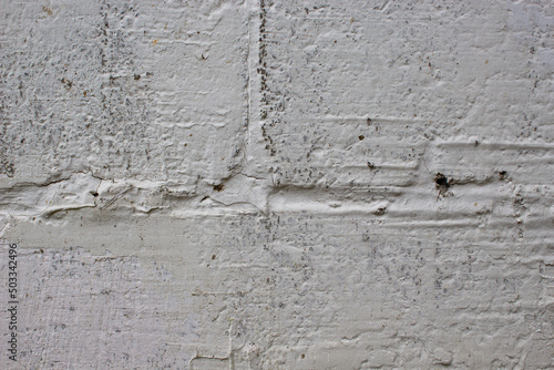 Texture of gray rough putty on blocks.