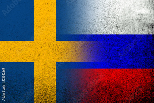 National flag of Russian Federation with The Kingdom of Sweden national flag. Grunge background