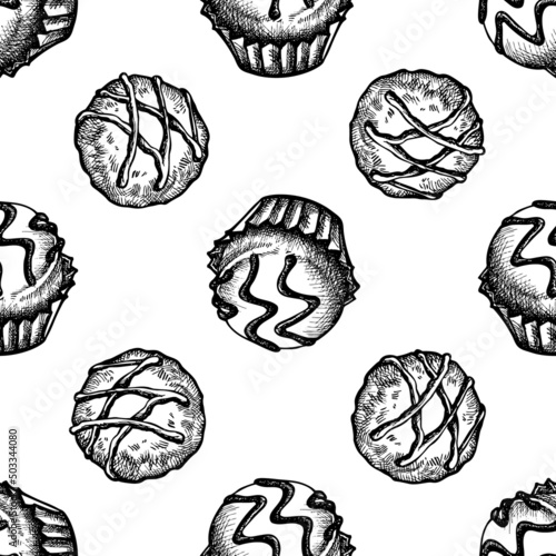 Seamless pattern with black and white chocolate candies