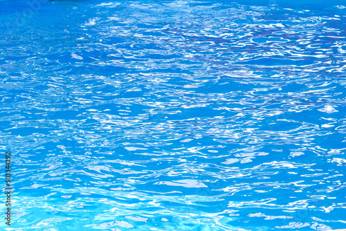 Small ripples on the surface of blue water