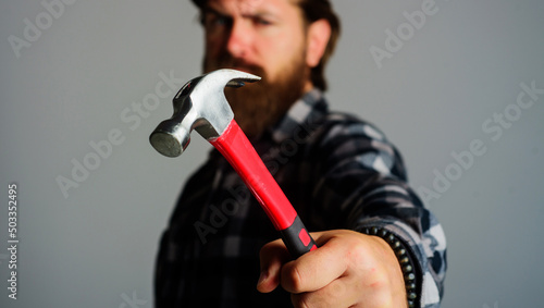 Εκτύπωση καμβά Male builder, Mechanical worker, carpenter or repairman with hammer in hand