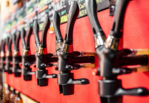 various types of craft beer tap are served in the beer store or bar