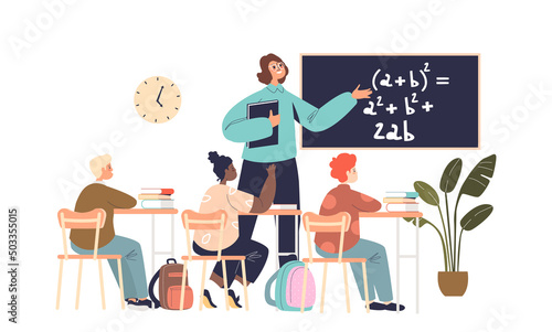 School teacher and class in classroom. Female pedagogue explain lesson on blackboard with pupils