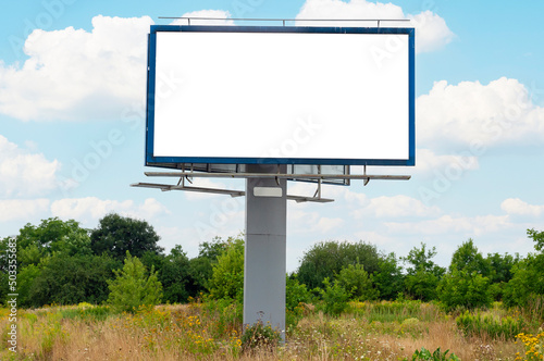 Advertising billboard mock-up in front of the bushes. Concept of investment areas