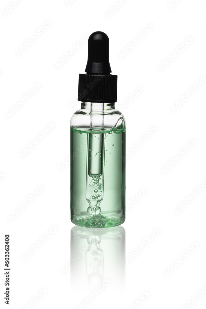 Glass bottle cosmetics with dropper and black lid. Green liquid essential, collagen serum and organic aroma oil for beauty isolated on white background with reflection Glass bottle cosmetics with dropper and black lid. Green liquid essential, collagen serum and organic aroma oil for beauty isolated on white background with reflection
