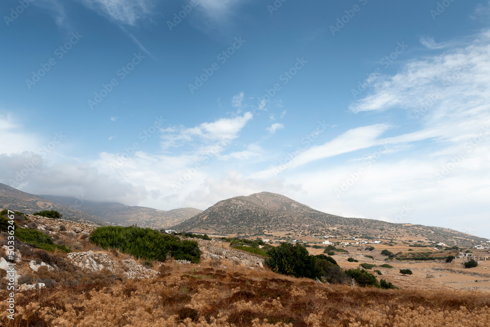 View of rural area in Paros, with the mountains in the background