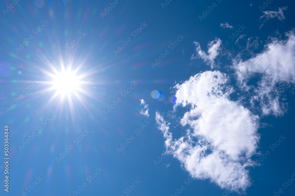 Sun rays against a blue sky Sun rays against a blue sky