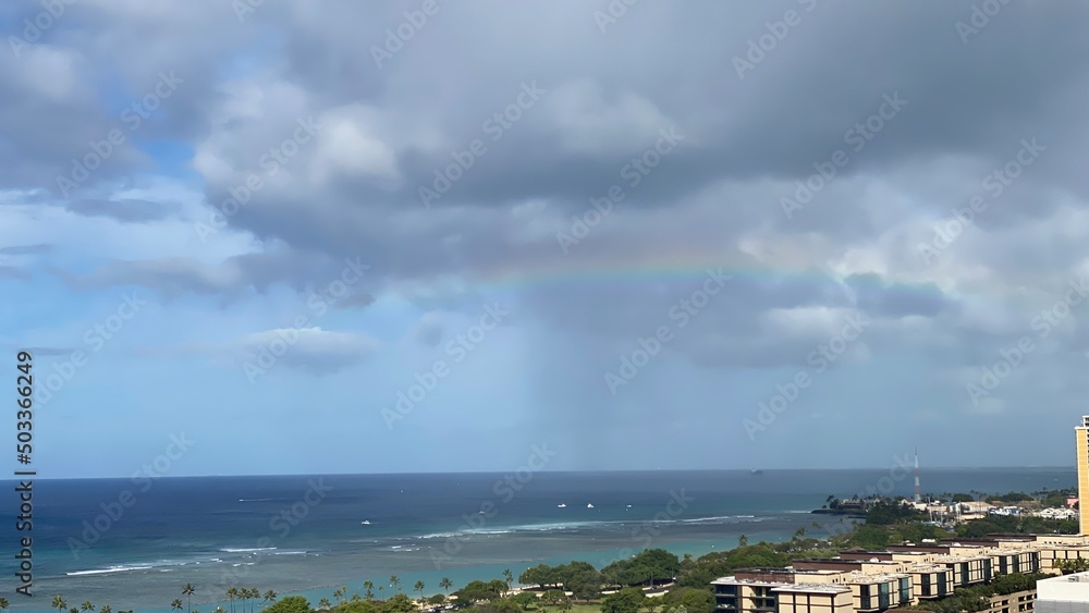 Rainbow over the Honolulu Ala Moana beach area, view from the Ala Moana hotel, Oahu island Hawaii, year 2022