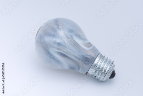 old light bulb with broken tungsten wolfram filament