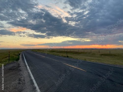 sunset over the road