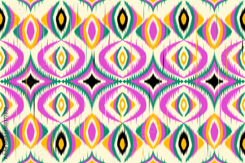 Ethnic Ikat Geometric oriental pattern on fabric in Indonesia and other Asian countries design for background and wallpaper. Seamless striped pattern in Aztec style. Folk embroidery.