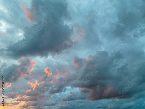 Rain clouds and sunrise sky